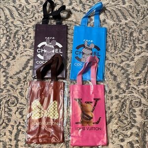 Assorted Designer-Inspired wine bottle gift bag’s in Pink, Blue, Brown, Burgundy
